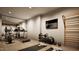 Well-equipped home gym featuring treadmills, weights, and exercise mats at 5428 Winding View Ln, Raleigh, NC 27615