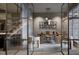Bright home office features a glass partition and modern desk at 5428 Winding View Ln, Raleigh, NC 27615