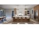 Modern kitchen with island and stainless steel appliances at 5428 Winding View Ln, Raleigh, NC 27615