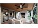 Relaxing covered patio with fireplace and comfortable seating at 5428 Winding View Ln, Raleigh, NC 27615