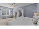 Bedroom with king-size bed, sitting area, and en-suite bathroom access at 13671 Burgess Rd, Middlesex, NC 27557