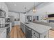 Open kitchen features a large island with granite countertops at 13671 Burgess Rd, Middlesex, NC 27557