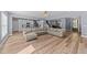Open concept living room with a view of the kitchen and entryway at 13671 Burgess Rd, Middlesex, NC 27557