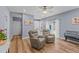 Open living area with two recliners and a view of the backyard at 13671 Burgess Rd, Middlesex, NC 27557