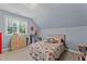 Charming bedroom with a firetruck themed bedspread at 13671 Burgess Rd, Middlesex, NC 27557