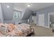 Spacious bedroom with a queen bed and en-suite bathroom access at 13671 Burgess Rd, Middlesex, NC 27557