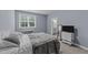Comfortable bedroom with a queen bed and a view at 13671 Burgess Rd, Middlesex, NC 27557