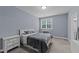 Simple bedroom with a full size bed and dresser at 13671 Burgess Rd, Middlesex, NC 27557