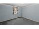 Small bedroom with window and carpet at 3716 Pearl Rd, Raleigh, NC 27610