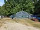 Large metal detached garage with additional smaller shed at 3716 Pearl Rd, Raleigh, NC 27610