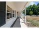 View of the front porch from the side at 3716 Pearl Rd, Raleigh, NC 27610