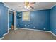 Simple bedroom with ceiling fan and closet at 3716 Pearl Rd, Raleigh, NC 27610