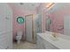 Bathroom with shower, toilet, and vanity at 3716 Pearl Rd, Raleigh, NC 27610