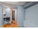Laundry room with sink, built-in shelving and cabinets at 3716 Pearl Rd, Raleigh, NC 27610