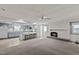 Kitchen features light blue cabinets and a breakfast bar at 3716 Pearl Rd, Raleigh, NC 27610