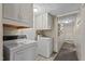 Laundry area with washer, dryer, and additional storage at 3716 Pearl Rd, Raleigh, NC 27610