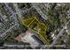 Aerial view of property showing lot lines and surrounding area at 3716 Pearl Rd, Raleigh, NC 27610