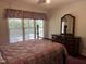 Bedroom with dresser, and double window with window seat at 901 Tanglewood Dr, Siler City, NC 27344