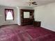 Bedroom with carpet, dresser, and nightstand at 901 Tanglewood Dr, Siler City, NC 27344