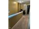 Upstairs hallway with carpeted floor and office area at 506 Averasboro Dr, Clayton, NC 27520