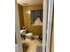 Small bathroom with single sink and toilet at 506 Averasboro Dr, Clayton, NC 27520