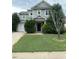 Two-story home with gray siding and landscaping at 506 Averasboro Dr, Clayton, NC 27520