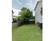 Backyard with privacy fence and landscaping at 506 Averasboro Dr, Clayton, NC 27520