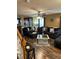 Spacious living room with dark wood floors and fireplace at 506 Averasboro Dr, Clayton, NC 27520