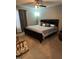 Main bedroom with king-size bed and ceiling fan at 506 Averasboro Dr, Clayton, NC 27520