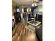 Spacious living room with dark wood floors and fireplace at 506 Averasboro Dr, Clayton, NC 27520