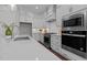 Modern kitchen with stainless steel appliances and a large island at 816 Willow Tower Ct # 154, Rolesville, NC 27571
