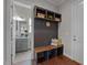 Entryway with bench, cubbies, and view of bathroom at 816 Willow Tower Ct # 154, Rolesville, NC 27571