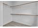 Spacious walk-in closet with ample shelving and hanging rods at 816 Willow Tower Ct # 154, Rolesville, NC 27571