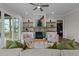 Spacious living room with fireplace and built-in shelving at 816 Willow Tower Ct # 154, Rolesville, NC 27571