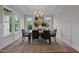 Bright dining room with hardwood floors and a chandelier at 816 Willow Tower Ct # 154, Rolesville, NC 27571