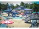 Relaxing community pool with waterslide and lounge chairs at 816 Willow Tower Ct # 154, Rolesville, NC 27571