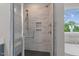 Spacious walk-in shower with multiple shower heads and built-in bench at 816 Willow Tower Ct # 154, Rolesville, NC 27571