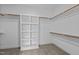 Large walk-in closet with shelving and hanging rods at 816 Willow Tower Ct # 154, Rolesville, NC 27571