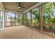 Relaxing screened porch with wooden deck and view of backyard at 812 Willow Tower Ct # 155, Rolesville, NC 27571