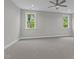 Spacious bedroom with ceiling fan and two windows at 812 Willow Tower Ct # 155, Rolesville, NC 27571