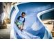 going down waterslide at community pool at 812 Willow Tower Ct # 155, Rolesville, NC 27571