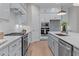 Modern kitchen with stainless steel appliances and ample counter space at 812 Willow Tower Ct # 155, Rolesville, NC 27571