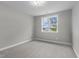 Bright bedroom featuring carpet and a large window at 812 Willow Tower Ct # 155, Rolesville, NC 27571