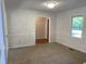 Bright dining room with hardwood floors and window at 7622 Lindley Mill Rd, Graham, NC 27253