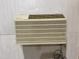 Pre-owned window air conditioning unit installed in the wall at 7622 Lindley Mill Rd, Graham, NC 27253