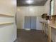 Workshop with built-in shelving and workbenches at 7622 Lindley Mill Rd, Graham, NC 27253