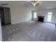 Open living room with fireplace and access to backyard at 31 Grace Ridge Ct, Benson, NC 27504
