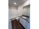 Clean bathroom with granite countertop vanity and tub at 31 Grace Ridge Ct, Benson, NC 27504