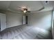 Large bedroom with ceiling fan and plush carpeting at 31 Grace Ridge Ct, Benson, NC 27504
