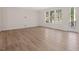 Bright living room with hardwood floors and access to deck at 146 Wood Wedge, Sanford, NC 27332